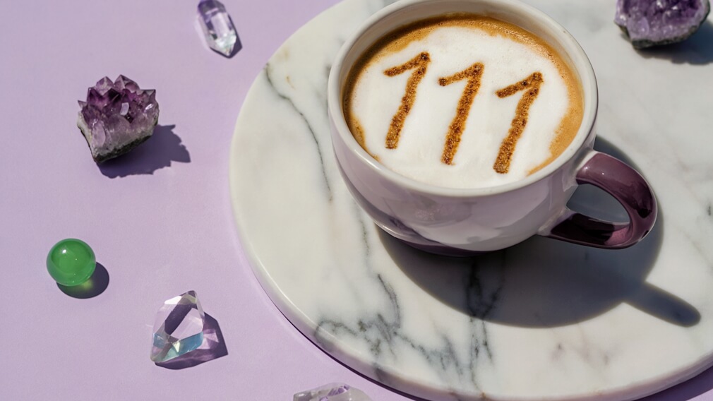 111 Angel Number Coffee Cup Manifestation Crystals on Table