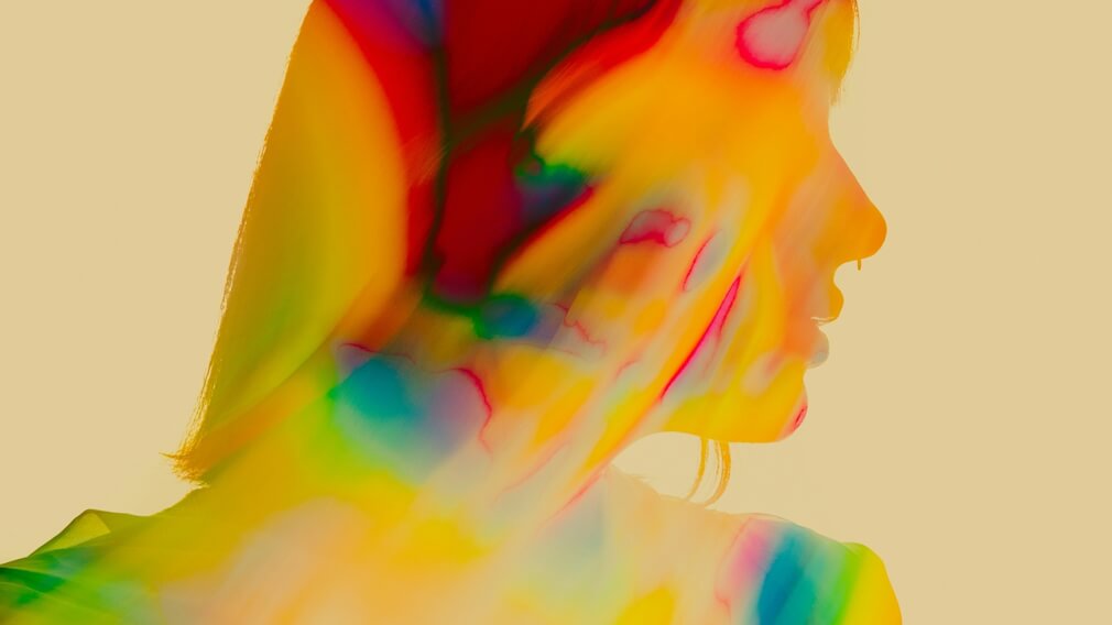 Artistic profile of a woman in psychedelic colors